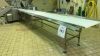STAINLESS STEEL POWERED CONVEYOR APPROX.: 301" X 44" WITH 24" PLASTIC CHAIN, (1) MOTOR, CONTROL PANEL AND BUILT IN CHAIN WASH STATION (COOKING AREA)