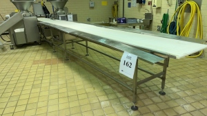 STAINLESS STEEL POWERED CONVEYOR APPROX.: 301" X 44" WITH 24" PLASTIC CHAIN, (1) MOTOR, CONTROL PANEL AND BUILT IN CHAIN WASH STATION (COOKING AREA)