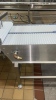 (2) STAINLESS STEEL POWERED CONVEYOR APPROX.: 183" X 39" WITH 12" PLASTIC CHAIN, (2) MOTORS, (2) CONTROL PANELS AND BUILT IN CHAIN WASH STATIONS (BAKERY 1) - 5