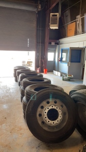 (21) ASSORTED NEW, USED, RECAPPED TIRES AND (3) ALUMINUM RIMS (TRUCK SHOP)