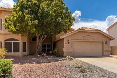 Stunning semi-custom home in Foothills gated golf community! Travertine, granite, all-natural wood thru-out. Remodeled kitchen/baths/lighting. Neutral paint thru-out. Wood Plantation Shutters & Duet Blinds thru-out.