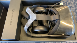 OCULUS QUEST ALL IN ONE VR GAMING HEADSET WITH CONTROLS AND CHARGER (LOCATION: CECILIA HALL)