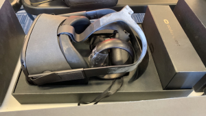 OCULUS QUEST ALL IN ONE VR GAMING HEADSET WITH CONTROLS AND CHARGER (LOCATION: CECILIA HALL)