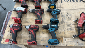 LOT OF (11) ASST'D MILWAUKEE & MAKITA DRILLS (NO BATTERIES OR CHARGERS FOR MAKITA) (8 CHARGING STATIONS FOR MILWAUKEE ONLY)