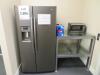 LOT GENERAL ELECTRIC 2 DOOR REFRIGERATOR WITH ICE MAKER, EMERSON MICROWAVE, AND HEAVY DUTY METAL TABLE, (UP-STAIRS)