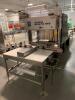 Norland International Shrink Pak 5000 Automatic Shrink Wrapper. Serial Number 5477. Max Speed 12 packages per minute, Bottle size 4.5" to 16.5" Tall, 3.0" Film Core, Max Case Size 28" x 16", PLC Controls, approx 82" x 58" x 60"<br><br />