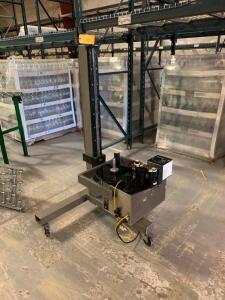 Label-Aire Model 2111-M Pressure Sensative Bottle Labeler, Serial number 6-17979011. 115V 1PH, 3" Core, 12" label reel, digital controls, on portable stand.<br><br />