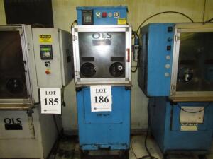 2000 OLS 1200 2-STATION DEBURRING MACHINE, WITH (2) ROTATING WORK FIXTURES, (2) DEBURRING HEADS, ALLEN-BRADLEY OPERATORS INTERFACE, COOLANT SERIAL NO.