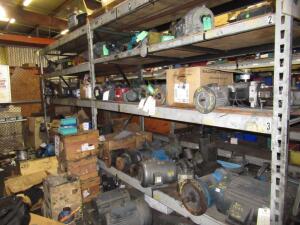 (LOT) ASSORTED MOTOR, BELTS, BEARINGS, HOSES, COILS, SPROCKETS, CHAIN, CYLINDERS, SPINDLE SHEARS, ETC. CABINETS INCLUDED, (RACKING NOT INCLUDED)