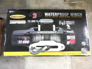 SMITTYBUILT 12V WATERPROOF 12,000LB WINCH (LOCATED AT 4502 BRICKELL PRIVADO, ONTARIO CA 91761)