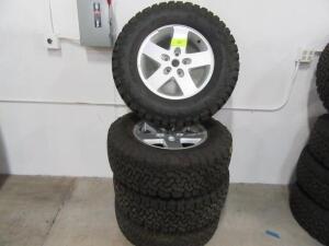 SET OF 4 JeeP JK STOCK 17" WHEELS W/ LT265/70 R17 BFGOODRICH TIRES (LOCATED AT 4502 BRICKELL PRIVADO, ONTARIO CA 91761)