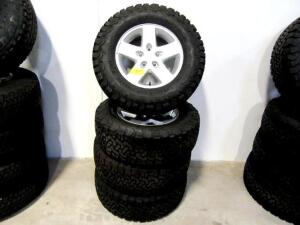 SET OF 4 JeeP JK STOCK 17" WHEELS W/ LT265/70 R17 BFGOODRICH TIRES (LOCATED AT 4502 BRICKELL PRIVADO, ONTARIO CA 91761)